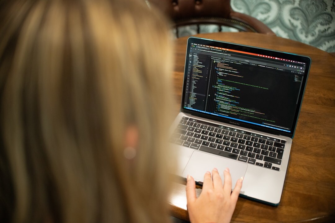 blog developer coding on laptop